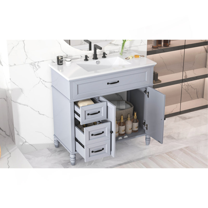 Meuble-lavabo élégant avec lavabo offrant beaucoup de rangement et des matériaux de haute qualité pour un espace de salle de bain fonctionnel et élégant.