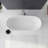 Transolid Skylar 59-Inch Freestanding Oval Soaking Bathtub with Center Drain and Bath Pillow in Matte White