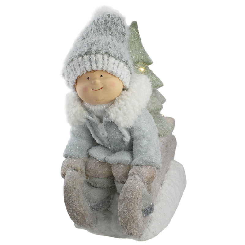 Décoration de Noël garçon sur un traîneau 15 po beige et vert