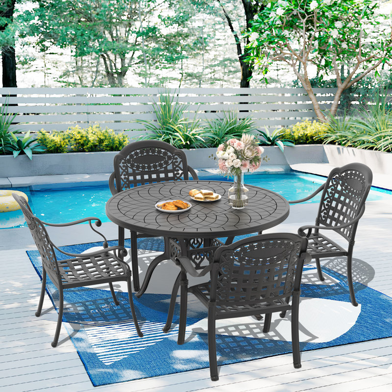 4-Person 47.24" Round Patio Dining Set with 4 Stackable Chairs, Blue Cushions