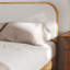 Structure de lit tapissier Lorrell Boucle-101121739