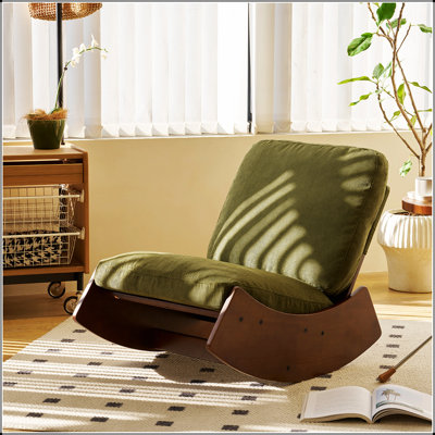 Chaise berçante confortable avec revêtement de haute qualité et structure en bois massif, parfaite pour la détente et la durabilité