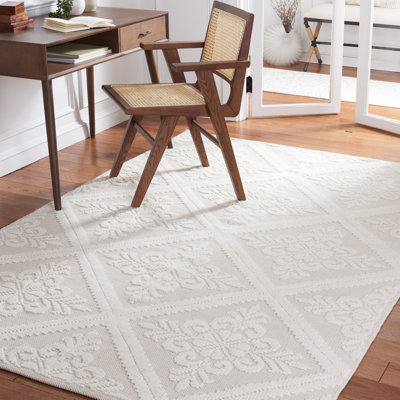 Tapis ivoire en laine / coton touffeté à la main Sharene