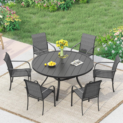 Ensemble repas pour 6 personnes avec table ronde et 6 chaises empilables