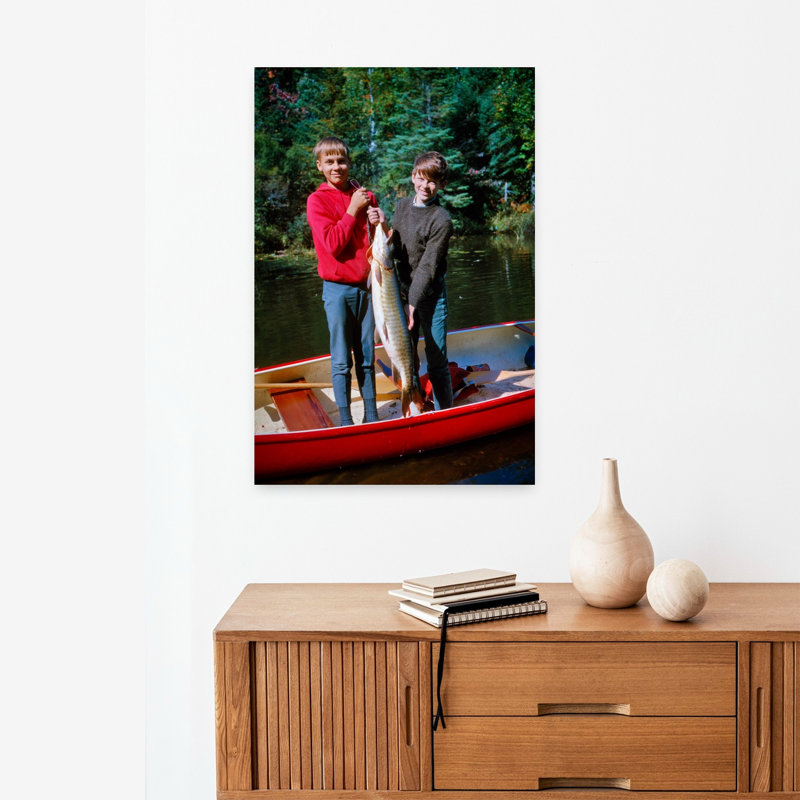 1960s TWO SMILING BOYS BROTHERS STANDING IN RED CANOE LOOKING AT CAMERA HOLDING UP BIG FISH BALLARD LAKE NORTHERN WISCONSIN USA 1 Piece Wrapped Canvas Wall Art