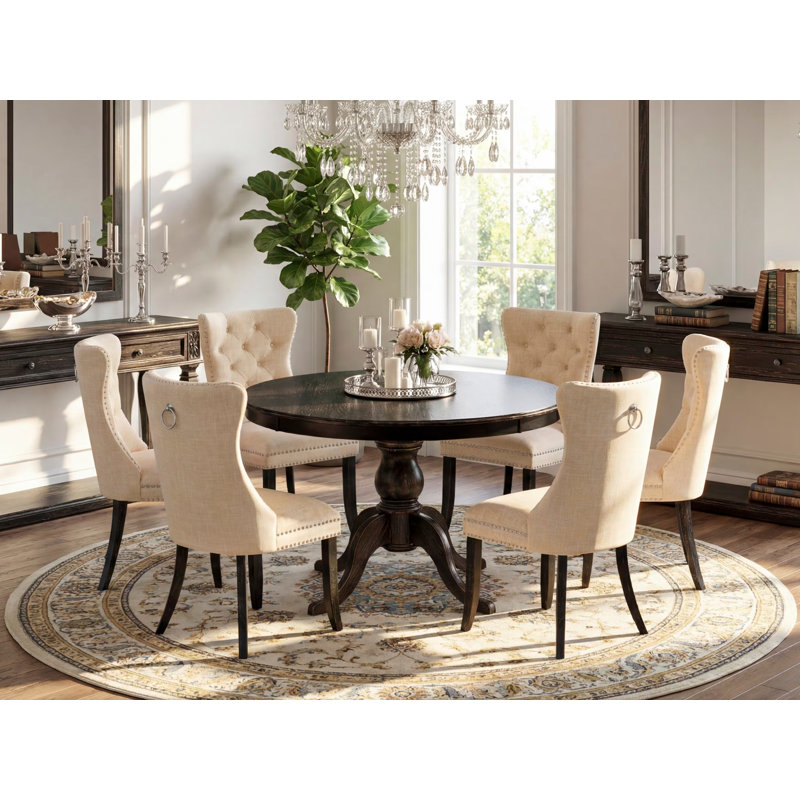 L'ensemble de salle à manger 7 pièces comprend une table et 6 chaises parsons en polyester beige clair avec dossier capitonné - Noir sablé