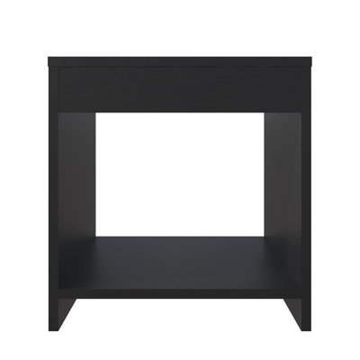 Table de chevet noire avec pochette de rangement ouverte pour économiser de l'espace dans la chambre à coucher: Design pratique