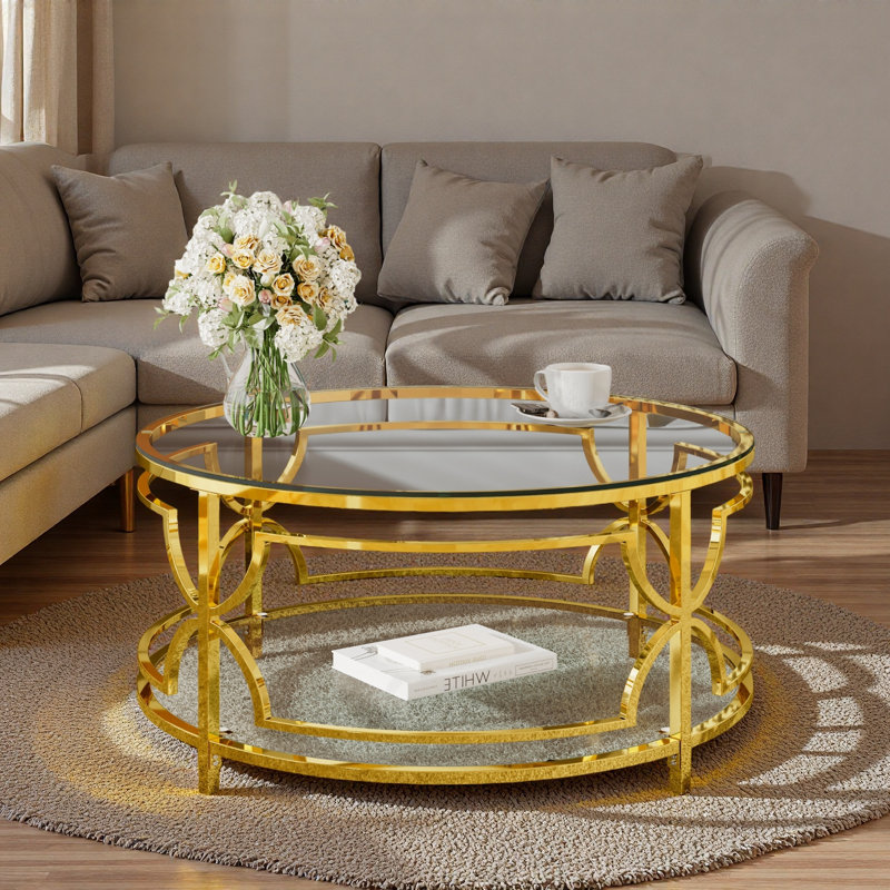Table basse ronde avec plateau en verre trempé, structure en métal géométrique et tablette inférieure, Transparent