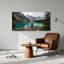 Tableau sur toile représentant un lac de montagne turquoise avec des sommets enneigés et des pins-801713365
