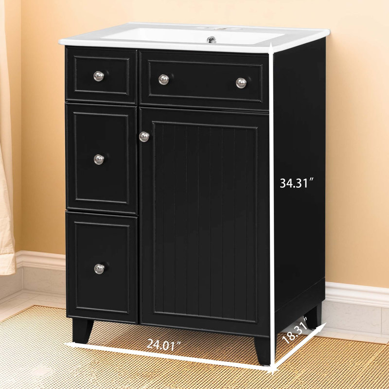 Le meuble-lavabo de 24 pouces avec lavabo en céramique, équipé de 2 tiroirs et d'une porte, offre un espace de rangement pratique pour répondre aux besoins de lavage et de rangement de la salle de bain, conception simple et pratique