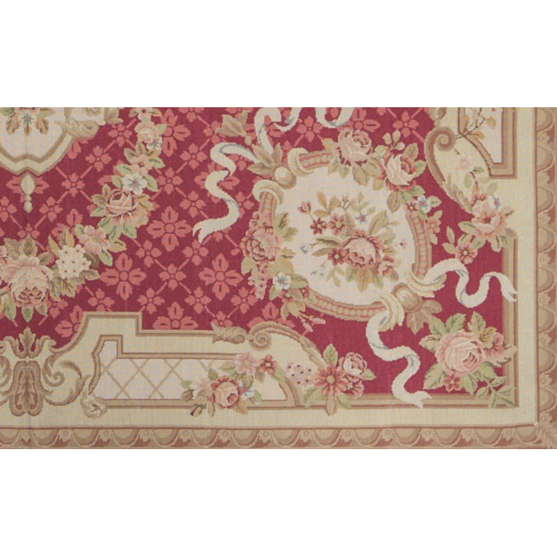 Tapis rouge et or de haute qualité noué à la main