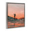 «Woman Surfing at Sunset», art mural encadré par Amelia Noyes-792230825-805136749