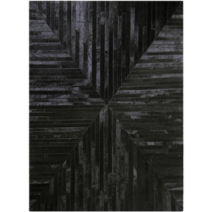 Tapis noir en peau de vache fabriqué à la main