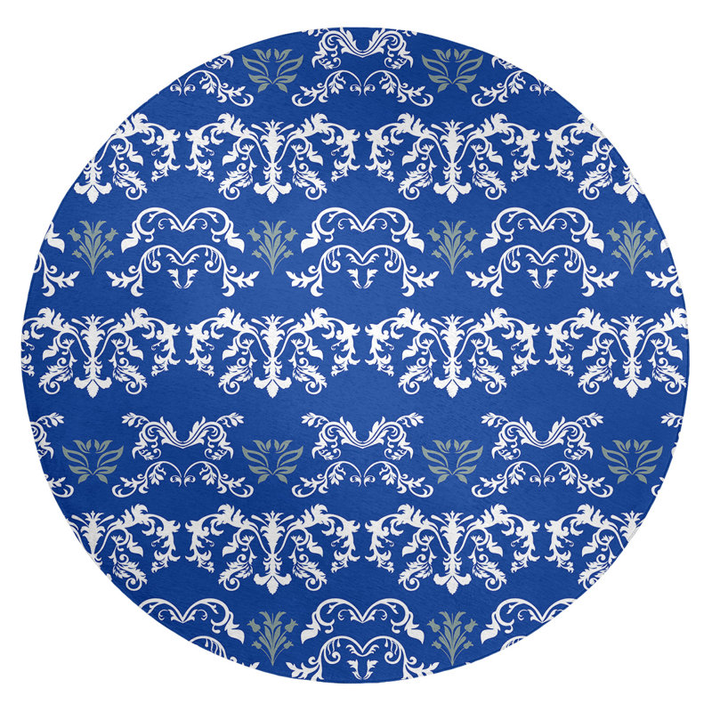 Tapis rond bleu damassé à motif baroque