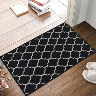 https://assets.wfcdn.com/im/80455418/resize-h310-w310%5Ecompr-r85/2365/236508753/Zayac+Black+Rug.jpg