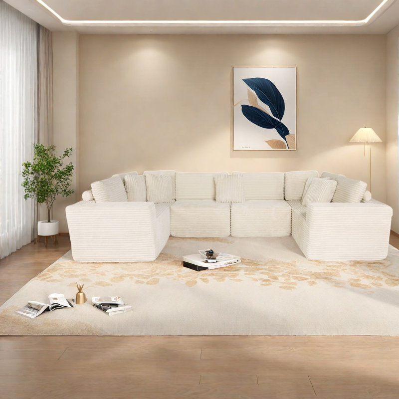 Canapé modulaire peu encombrant, en polyester beige, idéal pour les salons modernes