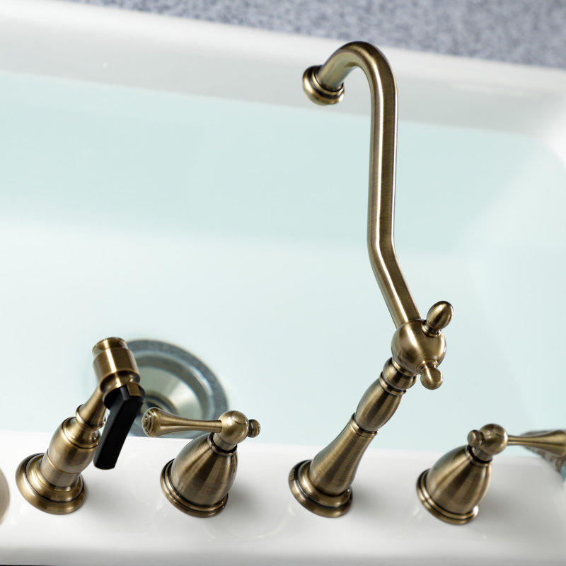 Kingston Brass Heritage Double-Handle 4-Hole Widespread Kitchen Faucet with Brass Sprayer, Vintage Brass