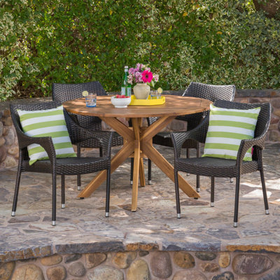 Stenger 4 - Person Acacia Wicker Patio Dining Set with Round Table
