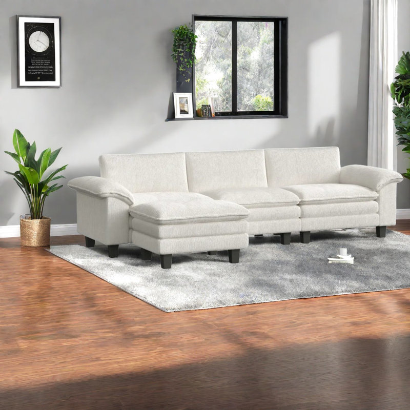 Canapé modulaire spacieux en velours côtelé beige pour un confort familial