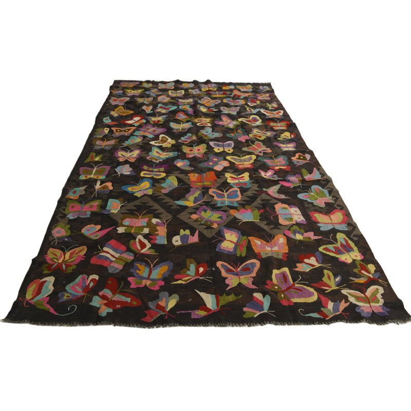 Tapis brun foncé Pelfrey