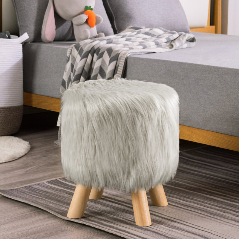 Tabouret de repose-pieds en fourrure artificielle Adelfina