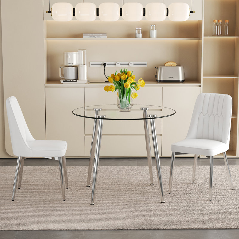Ensemble de salle à manger luxueux en métal argenté avec plateau en verre transparent - parfait pour les espaces minimalistes modernes, pour manger, prendre un café et plus encore