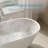 Ayago 65.98" x 29.53" Solid Surface Freestanding White Acrylic Soaking Bathtub, with Overflow and Matte Black Pop-up Drain-124302674