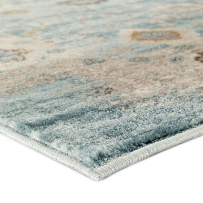 Tapis bleu clair à motif floral Soti