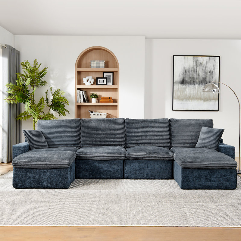 Canapé modulaire moderne avec assise profonde et méridienne confortable pour le salon