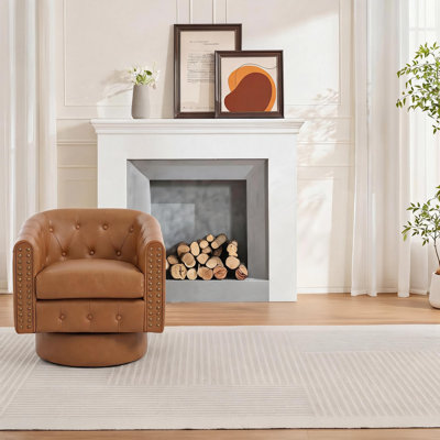 Fauteuil pivotant à 360° en forme de tonneau, revêtu de similicuir avec garniture rivetée - Siège rond confortable pour la lecture ou la coiffure, idéal pour le salon ou la chambre - Couleur : brun