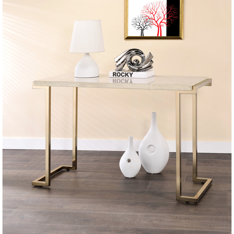 Table d'appoint en faux marbre avec base en métal couleur champagne
