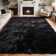 Soft black shag area rug