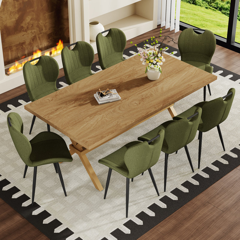 Ensemble de table et de chaises. Bureau de 71 po x 35,4 po en bois aggloméré avec table de salle à manger en X. Comprend 8 chaises de salle à manger en tissu vert olive avec poignée intégrée. Cadre en métal noir.