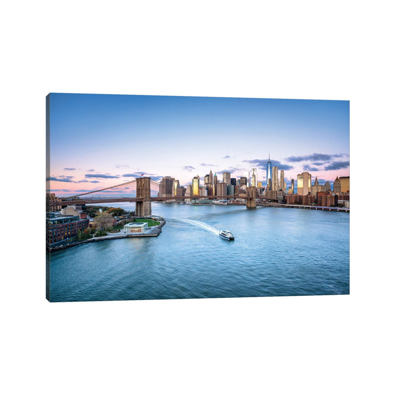 Brooklyn Bridge And Lower Manhattan Skyline On A Winter Morning by Jan Becke - Wrapped Canvas Print