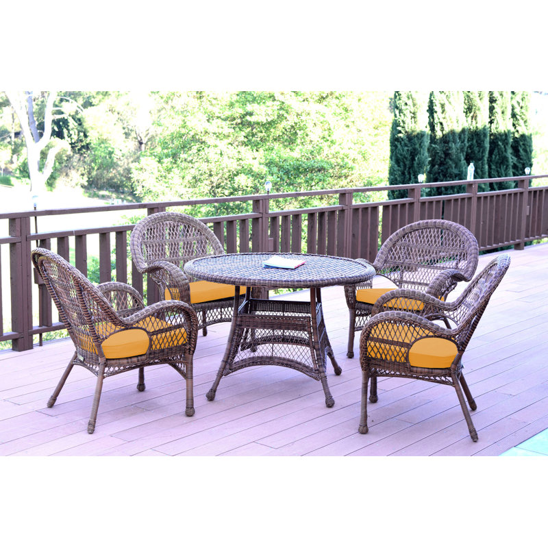 Mangum 4 - Person Wicker Patio Dining Set with Round Table, Honey, Ivory