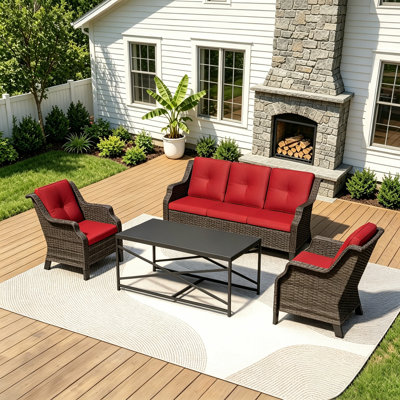 Ensemble de meubles de patio en osier 4 pièces, canapé 3 places, 2 chaises, table basse et coussin rouge