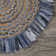 Whimsical Hand-braided Natural Fiber Jute Round Indoor Area Rug with Fringe