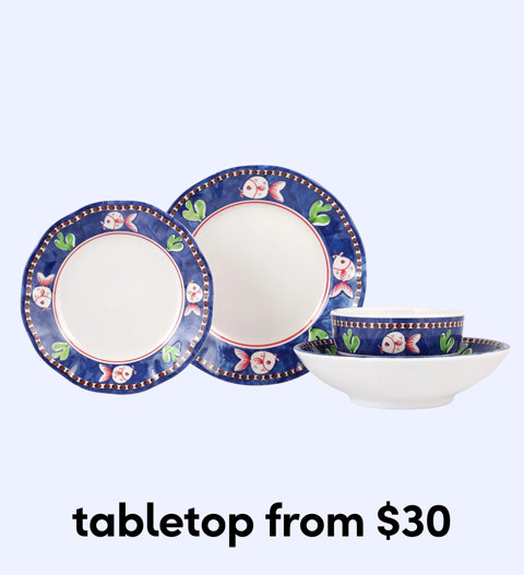 A set of blue and white ceramic outdoor dinnerware featuring a red fish and green leaf pattern from $30.