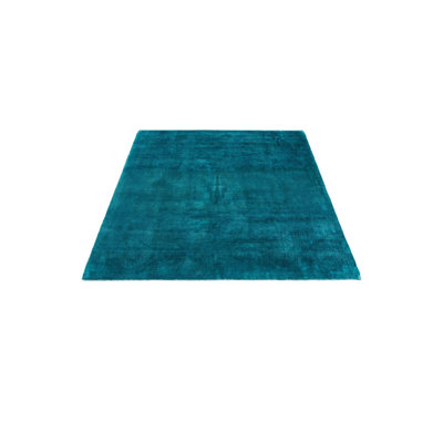 Tapis carré bleu sarcelle Kalmanovitz