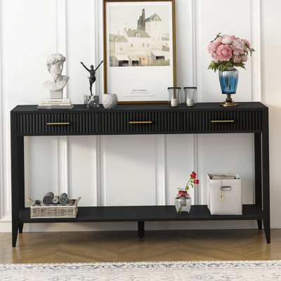 Console d'entrée de haute qualité avec tiroirs à rayures verticales et pieds longs, parfaite pour ajouter style et fonctionnalité à votre espace