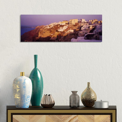 Town On A Cliff, Santorini, Greece by Panoramic Images - Wrapped Canvas Panoramic Print