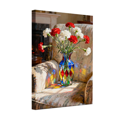 Plants & Flowers Floral Arrangement In Colorful Vase On Couch