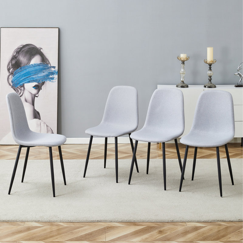 Confortable ensemble de chaises de salle à manger en lin et coton - Quatre pièces en gris clair. Siège et dossier intégrés, matériau en lin et coton, assorti à la maison moderne.