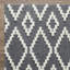 Tapis d'intérieur bleu en polyester tissé à la machine Eliot-655639988