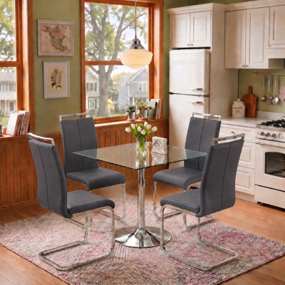 Table de salle à manger contemporaine en verre avec chaises ergonomiques à bras cantilever