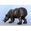 Statue en bronze Ilmars Relaxed Rhino - Taille: L 16 po x l 9 po x H 8 po.