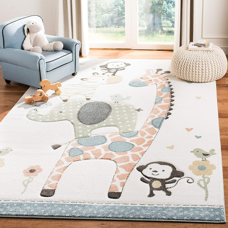 Tapis moderne ivoire à motif fantaisie, revêtement de sol intérieur doux et durable