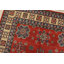 Tapis oriental rouge en laine noué à la main 5 pi 1 po x 7 pi 2 po Kazak