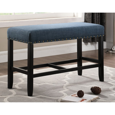 Banc en tissu bleu avec garniture cloutée et repose-pieds