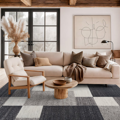 Tapis gris, noir et blanc touffeté à motif géométrique Akieba